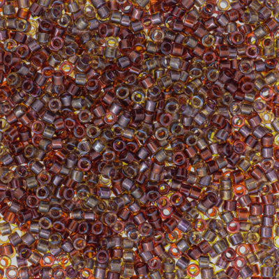 Close-up of small brown and orange beads