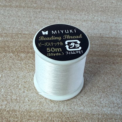 Close up of beading thread on a spool